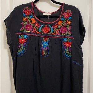 Black dress with floral embroidery detail